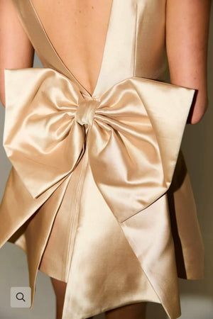 ODD MUSE Ultimate Muse Bow Detail Mini Dress in Gold.